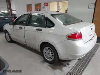 2009 Ford Focus SE with VIN 1FAHP35N59W180791, listed as a IAAI auction lot 42041573 with 201,464 mi miles. Bid and sale history available at carsss.com. Image 3.