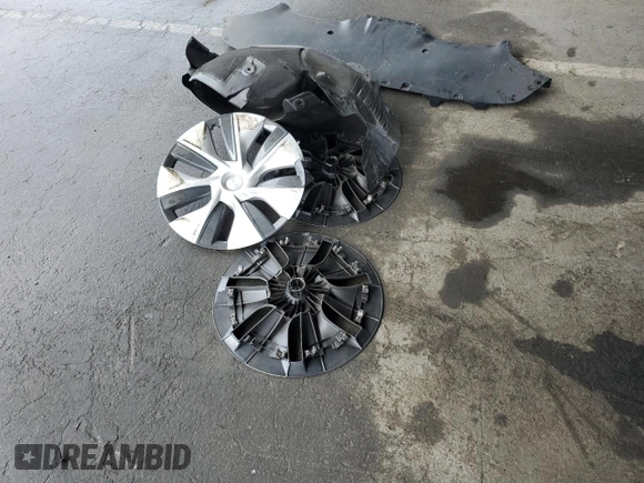 2024 Tesla Model Y Long Range with VIN 7SAYGDEE6RF025366, listed as a Copart auction lot 49328055 with 10,319 mi miles and Salvage Title. Bid and sale history available at DreamBid. Image 14.