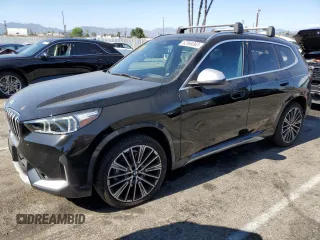 2023 BMW X1 xDrive28i with VIN WBX73EF05P5W78138, listed as a Copart auction lot 62868065 with 12,534 mi miles and Salvage title. Bid and sale history available at DreamBid. Image 1.