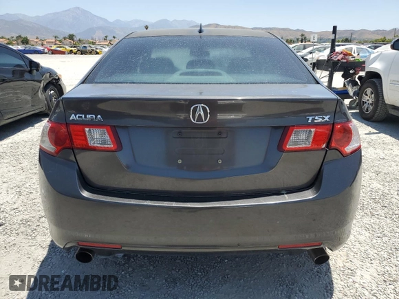 2009 Acura TSX z VIN JH4CU266X9C024552, wystawiony jako Copart lot #60822145 z przebiegiem 210 678 mil mil oraz Szkoda całkowita • Salvage title. Historia ofert i sprzedaży dostępna na DreamBid. Obrazek 6.