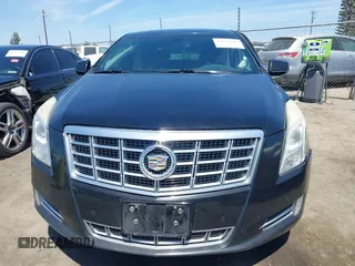 2013 Cadillac XTS Luxury z VIN 2G61R5S32D9226506, wystawiony jako IAAI lot #42208105 z przebiegiem 140 255 mil mil oraz . Historia ofert i sprzedaży dostępna na DreamBid. Obrazek 12.