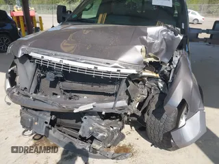 2014 Ford F-150 XL with VIN 1FTFW1ET5EFA77288, listed as a IAAI auction lot 42106634 with 74,582 mi miles. Bid and sale history available at carsss.com. Image 6.