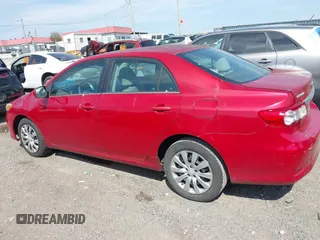 2013 Toyota Corolla L with VIN 5YFBU4EE2DP152852, listed as a IAAI auction lot 42084919 with 243,636 mi miles. Bid and sale history available at carsss.com. Image 14.
