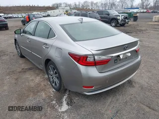 2017 Lexus ES 300h with VIN JTHBW1GG2H2147869, listed as a IAAI auction lot 41999737 with 88,008 mi miles and . Bid and sale history available at DreamBid. Image 3.