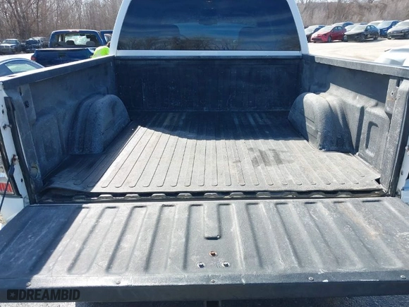 2005 Chevrolet Silverado 1500 LS with VIN 2GCEK13T151233103, listed as a IAAI auction lot 41656738 with 216,008 mi miles. Bid and sale history available at carsss.com. Image 18.