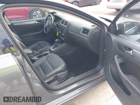 2014 Volkswagen Jetta TDI with VIN 3VWLL7AJ0EM386019, listed as a IAAI auction lot 42229260 with 122,858 mi miles and . Bid and sale history available at DreamBid. Image 5.