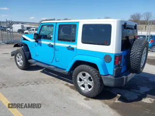 2017 Jeep Wrangler Unlimited Sahara with VIN 1C4BJWEG8HL655998, listed as a IAAI auction lot 41906919 with 100,350 mi miles and . Bid and sale history available at DreamBid. Image 3.