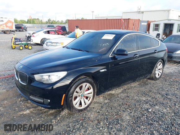2013 BMW 5 Series GT 535i xDrive with VIN WBASP2C50DC338989, listed as a IAAI auction lot 42041585 with 121,429 mi miles. Bid and sale history available at carsss.com. Image 2.