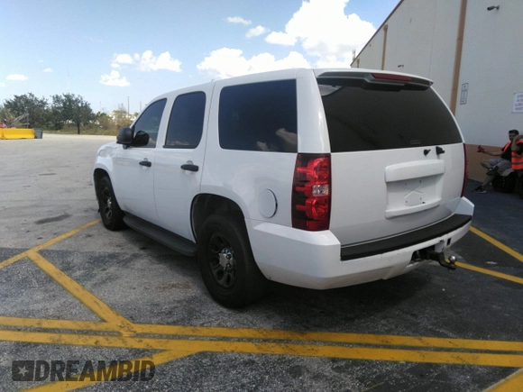 2011 Chevrolet Tahoe Commercial with VIN 1GNLC2E02BR325621, listed as a IAAI auction lot 41866389 with 167,693 mi miles and . Bid and sale history available at DreamBid. Image 3.