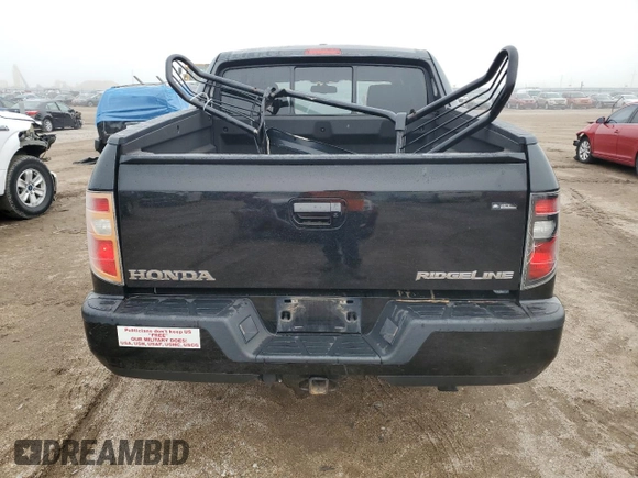 2013 Honda Ridgeline RTL z VIN 5FPYK1F5XDB004190, wystawiony jako Copart lot #58761335 z przebiegiem 56 943 mil mil oraz Czysty tytuł • Clean title. Historia ofert i sprzedaży dostępna na DreamBid. Obrazek 6.