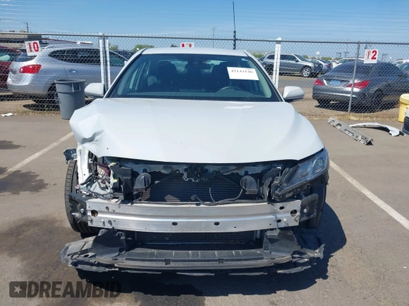 2024 Toyota Camry LE z VIN 4T1C11AK3RU214854, wystawiony jako IAAI lot #42143146 z przebiegiem 50 344 mil mil oraz . Historia ofert i sprzedaży dostępna na DreamBid. Obrazek 6.