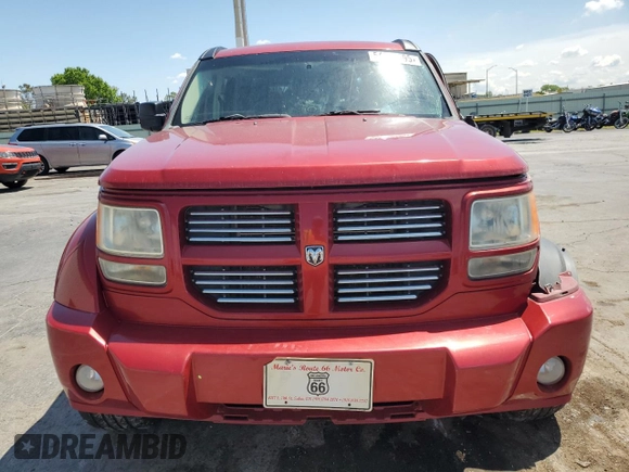 2010 Dodge Nitro Heat with VIN 1D4PT4GKXAW156990, listed as a Copart auction lot 54610695 with 180,620 mi miles and Salvage title. Bid and sale history available at DreamBid. Image 5.