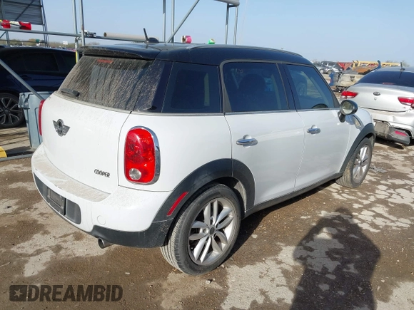 2012 MINI Countryman z VIN WMWZB3C53CWM02541, wystawiony jako IAAI lot #41720086 z przebiegiem 99 820 mil mil oraz . Historia ofert i sprzedaży dostępna na DreamBid. Obrazek 4.