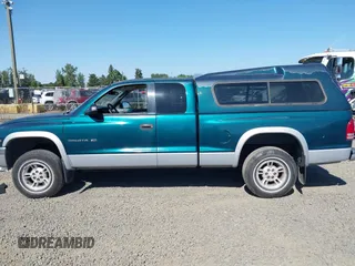 1999 Dodge Dakota SLT with VIN 1B7GG22Y2XS157214, listed as a IAAI auction lot 39776504 with 144,928 mi miles and . Bid and sale history available at carsss.com. Image 14.
