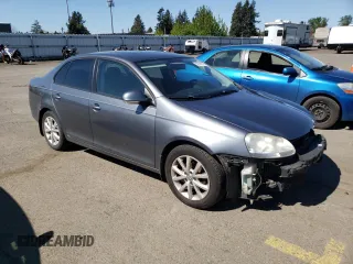 2010 Volkswagen Jetta SE z VIN 3VWRX7AJ4AM129714, wystawiony jako Copart lot #52975835 z przebiegiem 166 554 mil mil oraz Szkoda całkowita • Salvage title. Historia ofert i sprzedaży dostępna na DreamBid. Obrazek 4.