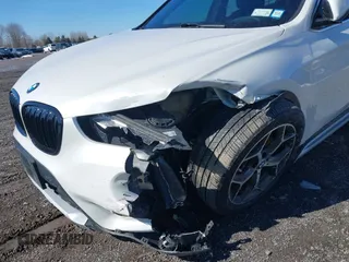 2019 BMW X1 xDrive28i with VIN WBXHT3C58K5N05523, listed as a IAAI auction lot 41752675 with 63,861 mi miles. Bid and sale history available at carsss.com. Image 6.