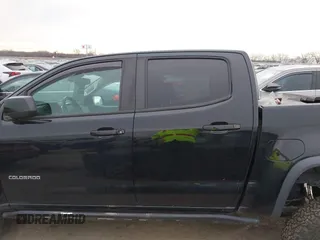 2018 Chevrolet Colorado 4WD ZR2 with VIN 1GCGTEENXJ1164617, listed as a IAAI auction lot 41354074 with 61,155 mi miles. Bid and sale history available at carsss.com. Image 14.