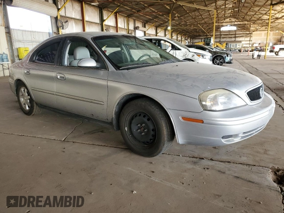 2001 Mercury Sable z VIN 1MEFM53U11G615352, wystawiony jako Copart lot #47451095 z przebiegiem 94 093 mil mil oraz Szkoda całkowita • Salvage title. Historia ofert i sprzedaży dostępna na DreamBid. Obrazek 4.