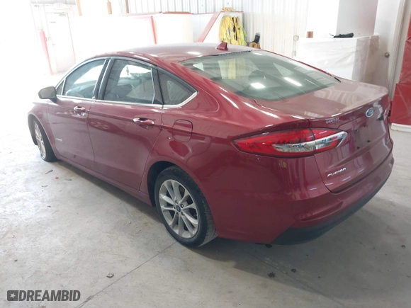 2019 Ford Fusion Hybrid SE with VIN 3FA6P0LUXKR205712, listed as a IAAI auction lot 41267049 with 124,687 mi miles. Bid and sale history available at carsss.com. Image 3.