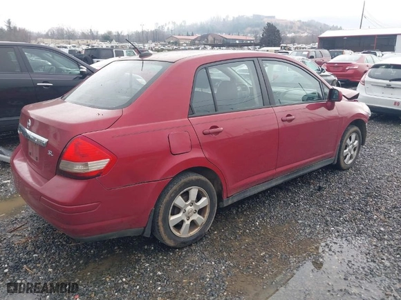 2010 Nissan Versa 1.8 S with VIN 3N1BC1APXAL420888, listed as a IAAI auction lot 41239495 with 224,860 mi miles. Bid and sale history available at carsss.com. Image 4.