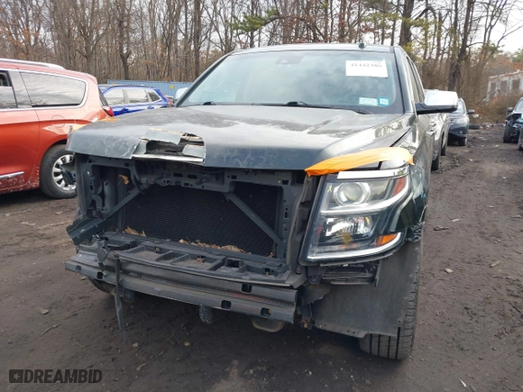 2016 Chevrolet Tahoe LTZ with VIN 1GNSKCKC1GR297871, listed as a IAAI auction lot 41442380 with 91,354 mi miles. Bid and sale history available at carsss.com. Image 12.