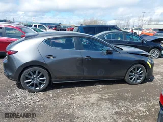 2021 Mazda Mazda3 Hatchback Select with VIN JM1BPBKLXM1337797, listed as a IAAI auction lot 42018058 with 46,763 mi miles. Bid and sale history available at carsss.com. Image 14.