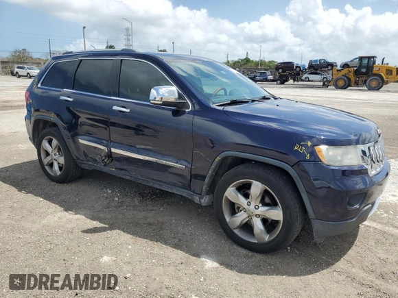 2013 Jeep Grand Cherokee Overland with VIN 1C4RJECT0DC533848, listed as a Copart auction lot 51319385 with 181,436 mi miles and Salvage Title. Bid and sale history available at carsss.com. Image 4.