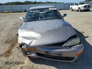 1996 Toyota Camry DX z VIN JT2BG12K7T0419839, wystawiony jako Copart lot #58267425 z przebiegiem 215 456 mil mil oraz Szkoda całkowita • Salvage title. Historia ofert i sprzedaży dostępna na DreamBid. Obrazek 5.