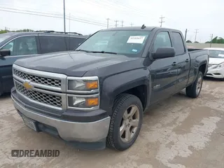 2014 Chevrolet Silverado 1500 LT with VIN 1GCRCREH5EZ371465, listed as a IAAI auction lot 42185657 with 112,151 mi miles and . Bid and sale history available at DreamBid. Image 2.