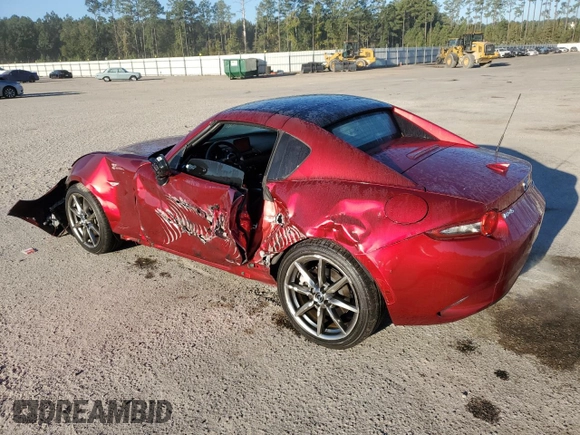 2023 Mazda MX-5 Miata Grand Touring with VIN JM1NDAM71P0559428, listed as a Copart auction lot 76596984 with 7,237 mi miles and Salvage title. Bid and sale history available at DreamBid. Image 2.