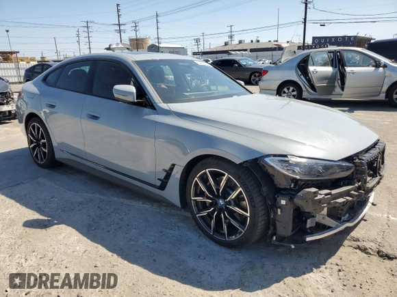 2022 BMW i4 eDrive40 with VIN WBY73AW07NFN14854, listed as a Copart auction lot 54082504 with 10,936 mi miles. Bid and sale history available at carsss.com. Image 4.