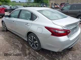 2017 Nissan Altima SV with VIN 1N4AL3AP3HC151424, listed as a IAAI auction lot 42697536 with 157,066 mi miles and . Bid and sale history available at DreamBid. Image 3.