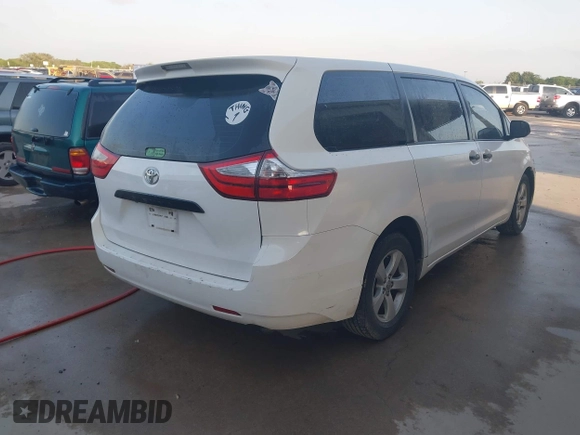 2015 Toyota Sienna L with VIN 5TDZK3DC5FS657115, listed as a IAAI auction lot 42109678 with 176,995 mi miles. Bid and sale history available at carsss.com. Image 4.