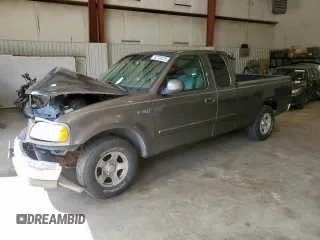 2002 Ford F-150 XL with VIN 1FTRX17212NB63939, listed as a Copart auction lot 62728225 with Not provided miles and Salvage title. Bid and sale history available at DreamBid. Image 1.