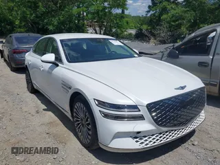 2023 Genesis G80 z VIN KMTGE4S15PU007107, wystawiony jako IAAI lot #42205296 z przebiegiem 29 878 mil mil oraz . Historia ofert i sprzedaży dostępna na DreamBid. Obrazek 1.