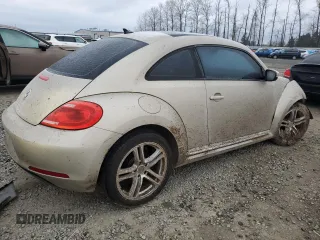 2013 Volkswagen Beetle 2.5L w/Sun with VIN 3VWJP7AT2DM673129, listed as a Copart auction lot 43284955 with 145,864 mi miles and Salvage title. Bid and sale history available at DreamBid. Image 3.