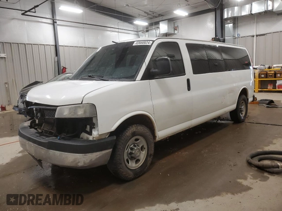 2014 Chevrolet Express Passenger LT with VIN 1GAZG1FG4E1176590, listed as a Copart auction lot 83660024 with 167,653 mi miles and Salvage title. Bid and sale history available at DreamBid. Image 1.