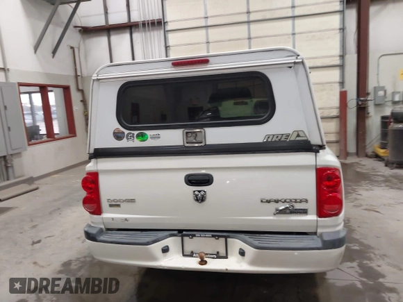 2009 Dodge Dakota Bighorn/Lonestar with VIN 1D3HW32P79S819674, listed as a IAAI auction lot 41962369 with 157,399 mi miles and . Bid and sale history available at carsss.com. Image 17.