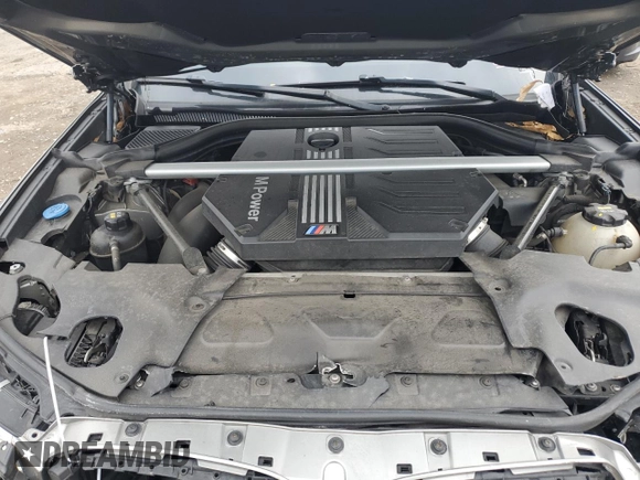2021 BMW X4 M z VIN 5YMUJ0C03M9F20053, wystawiony jako Copart lot #87595845 z przebiegiem Nie podano mil oraz Szkody całkowita. Historia ofert i sprzedaży dostępna na DreamBid. Obrazek 12.