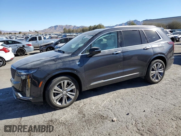 2022 Cadillac XT6 Premium Luxury with VIN 1GYKPCRS9NZ125022, listed as a Copart auction lot 42392485 with 34,703 mi miles and Salvage Title. Bid and sale history available at carsss.com. Image 1.