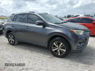 2018 Toyota RAV4 XLE with VIN JTMWFREV1JJ742694, listed as a Copart auction lot 51093695 with 74,502 mi miles and Salvage Title. Bid and sale history available at DreamBid. Image 4.