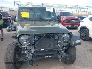 2021 Jeep Wrangler Unlimited Sport S with VIN 1C4HJXDN6MW669228, listed as a IAAI auction lot 42301326 with 64,503 mi miles and . Bid and sale history available at DreamBid. Image 12.