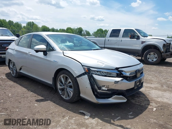 2018 Honda Clarity z VIN JHMZC5F14JC007026, wystawiony jako IAAI lot #42361556 z przebiegiem 74 132 mil mil oraz . Historia ofert i sprzedaży dostępna na DreamBid. Obrazek 1.