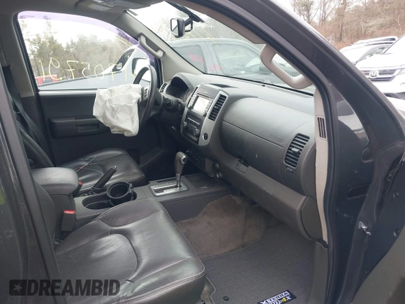 2014 Nissan Xterra X with VIN 5N1AN0NW5EN810488, listed as a IAAI auction lot 41705791 with 127,936 mi miles and . Bid and sale history available at DreamBid. Image 5.