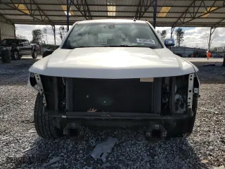 2015 Chevrolet Tahoe LTZ with VIN 1GNSCCKC9FR143064, listed as a Copart auction lot 45360745 with 140,751 mi miles and Salvage Title. Bid and sale history available at carsss.com. Image 5.