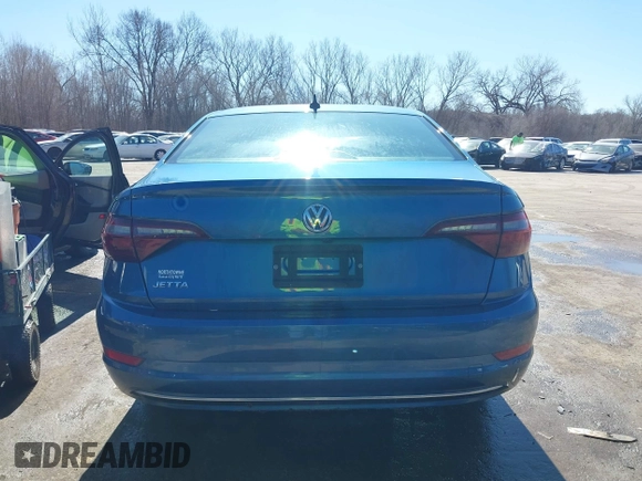 2021 Volkswagen Jetta S z VIN 3VWC57BU0MM009093, wystawiony jako IAAI lot #41643969 z przebiegiem 54 723 mil mil oraz . Historia ofert i sprzedaży dostępna na DreamBid. Obrazek 16.