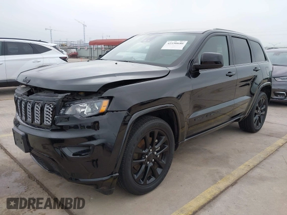 2021 Jeep Grand Cherokee Laredo X with VIN 1C4RJEAG8MC714539, listed as a IAAI auction lot 42190686 with 59,359 mi miles and . Bid and sale history available at DreamBid. Image 2.