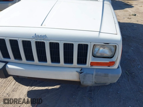 2001 Jeep Cherokee Sport with VIN 1J4FT48S61L582047, listed as a IAAI auction lot 42135003 with 160,716 mi miles and . Bid and sale history available at DreamBid. Image 14.