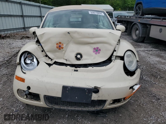 2009 Volkswagen Beetle S with VIN 3VWRF31Y99M409195, listed as a Copart auction lot 55010054 with 99,635 mi miles and Salvage title. Bid and sale history available at DreamBid. Image 5.