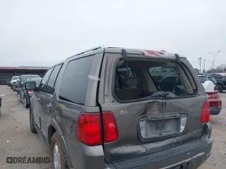 2004 Lincoln Navigator Luxury with VIN 5LMFU27RX4LJ41623, listed as a IAAI auction lot 41565114 with 214,590 mi miles. Bid and sale history available at carsss.com. Image 6.